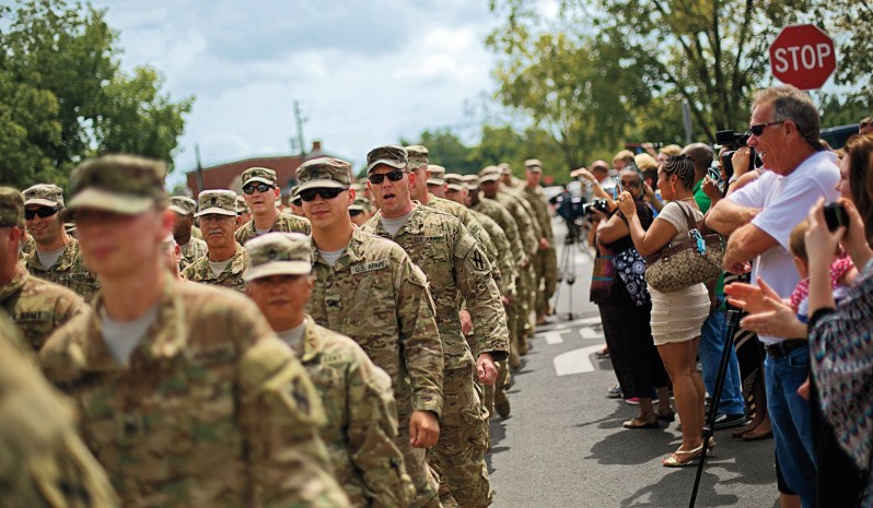 Always supportive of the troops: Crowds in Macon welcome back 200 members of the Georgia National Guard's 48th Infantry Brigade Combat Team returning from Afghanistan, September 2014. (David Goldman/AP)